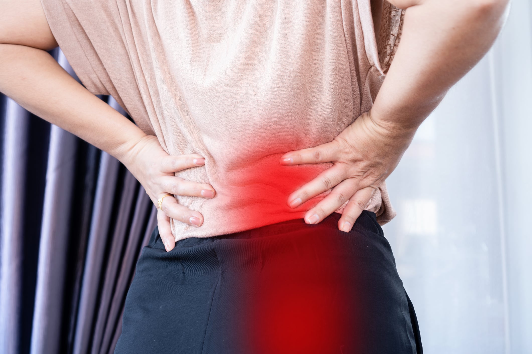 Person with sciatica nerve pain requiring specialized treatment in Campbell chiropractic clinic